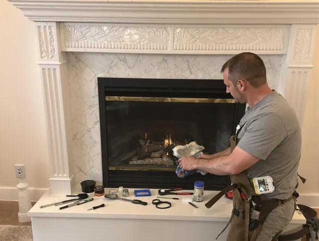 North Port Chimney Sweep performing fireplace maintenance in North Port, FL